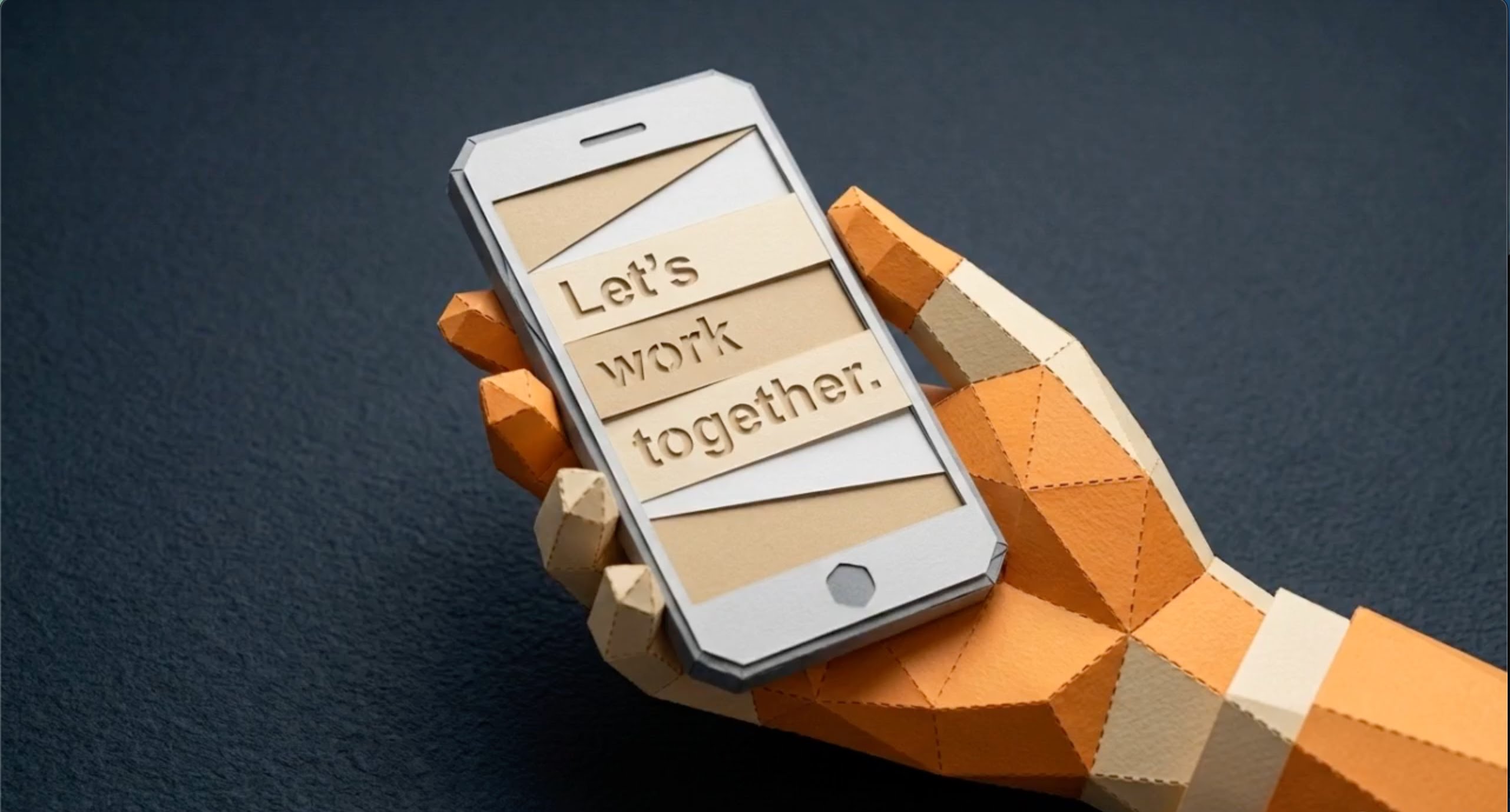 origami-hand-holding-phone-lets-work-together